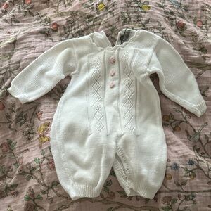 Classic White Knit Baby One-Piece with Pink Flower Buttons